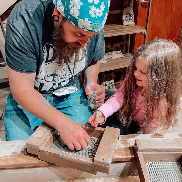 family enjoying gem panning
